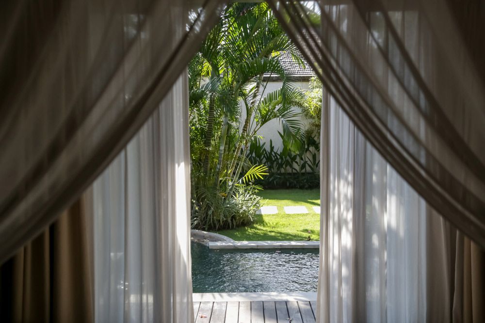 Open Door and Window with White Curtain — Blinds in Bogangar, NSW