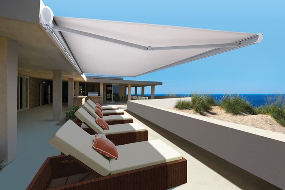 Folding Arm Awnings Enhancing Beach Views — Blinds in Bogangar, NSW