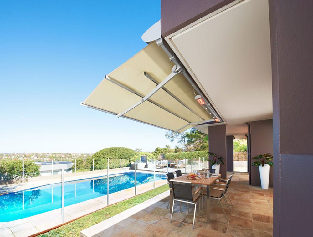 Folding Arm Awning Near Pool — Blinds in Bogangar, NSW