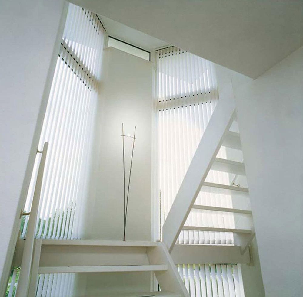 LXVB 69 Vertical Blinds Enhance Staircase Decor — Blinds in Bogangar, NSW