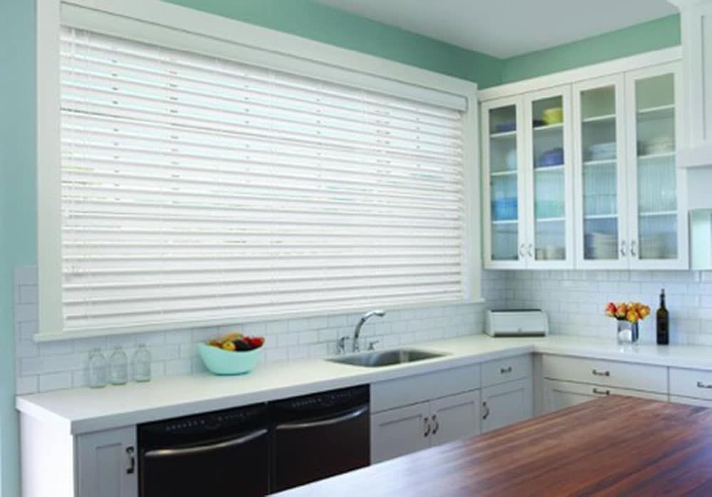 Light Venetian Blinds Enhancing Kitchen Ambiance — Blinds in Bogangar, NSW