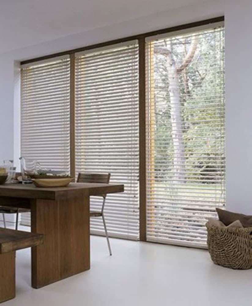 Natural Venetian Blinds Enhancing Dining Room — Blinds in Bogangar, NSW