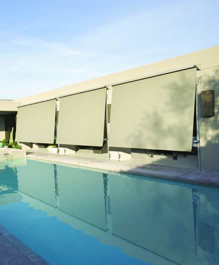 Outdoor Setting With Straight Drop Blinds — Blinds in Bogangar, NSW