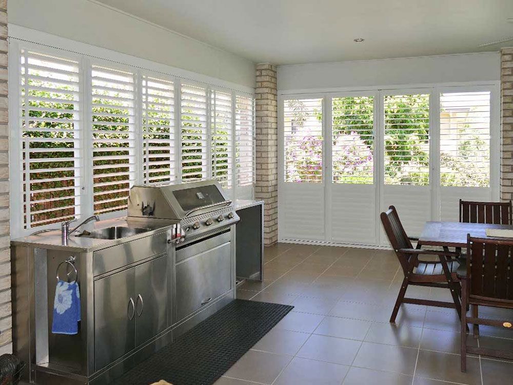 Patio Enclosure Shutters BBQ Area — Blinds in Bogangar, NSW