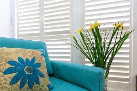 Corner Bedroom Enhanced with Thermalite Shutters — Blinds in Bogangar, NSW