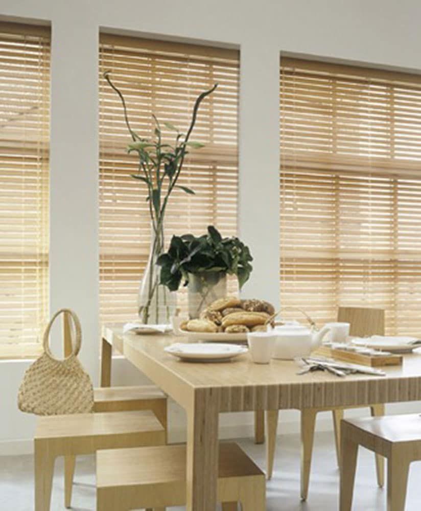 Stylish Venetian Blinds Enhancing Dining Room Ambiance — Blinds in Bogangar, NSW