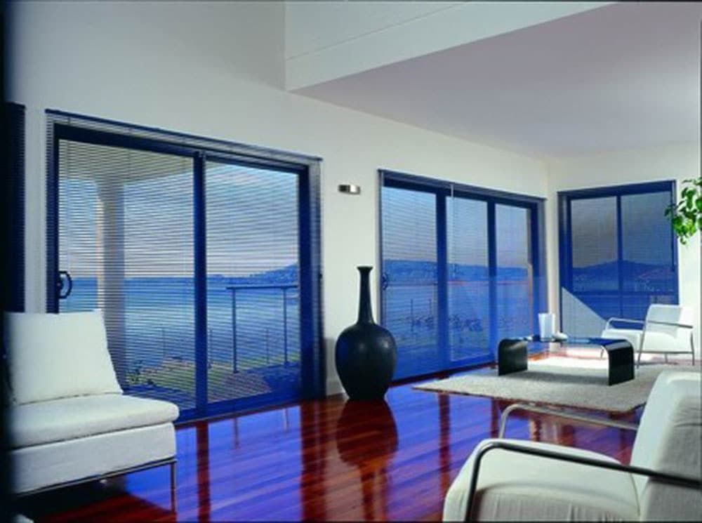 Black Venetian Blinds Enhance Lounge Ambiance — Blinds in Bogangar, NSW