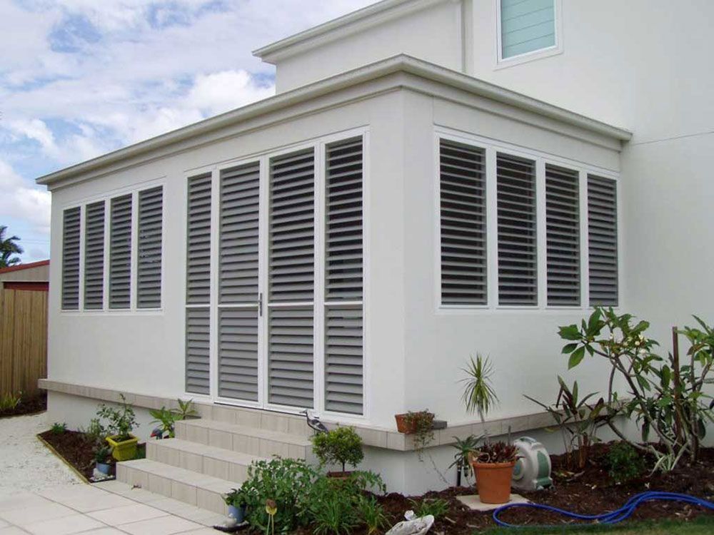 White Patio Enclosure Shutters Enhancing Security and Style — Blinds in Bogangar, NSW