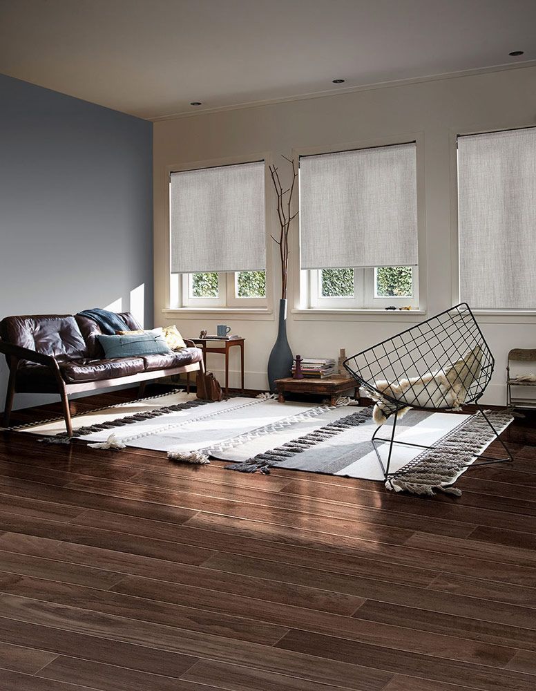White Roller Blinds Installation In Livingroom — Blinds in Bogangar, NSW