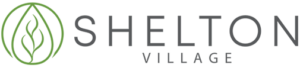 Shelton Village logo: green leaf inside a circle with text