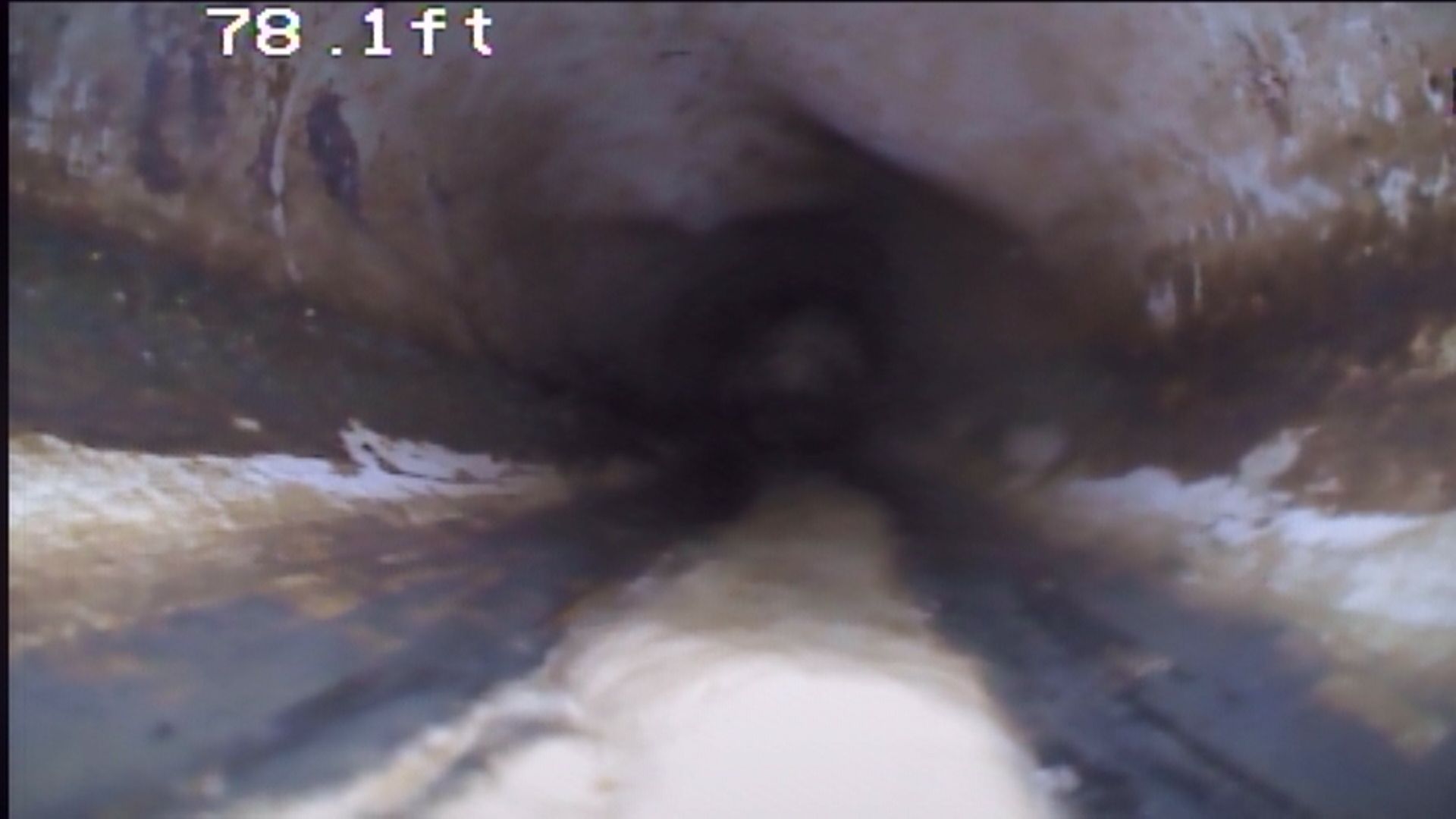Man Inspecting Pipe System — Grand Junction, CO — Scope It Out Now Man Inspecting Pipe System — Grand Junction, CO — Scope It Out Now