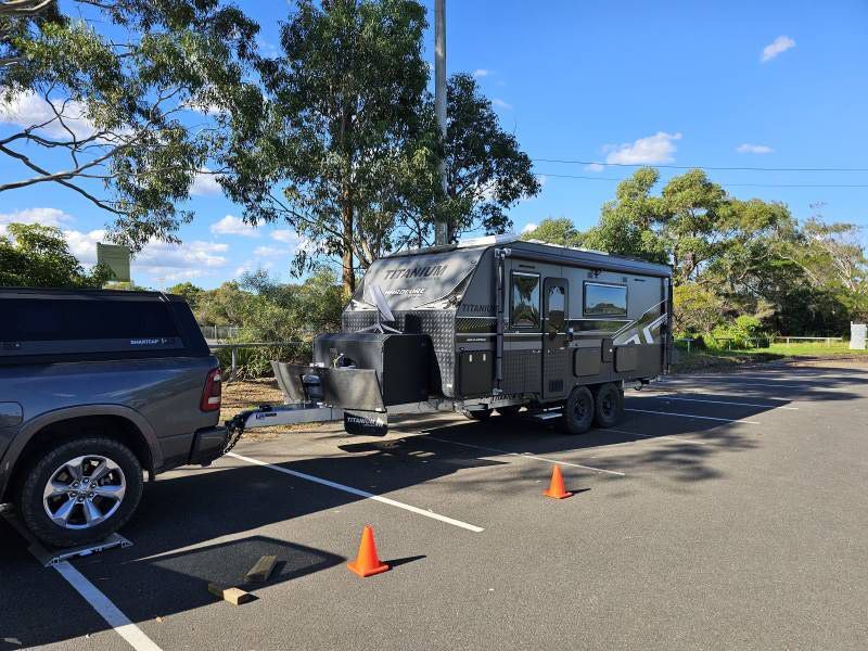 A Titanium Trailer Is Being Towed By A Truck — A Weigh In - Mobile Weighing Solutions in Noraville, NSW