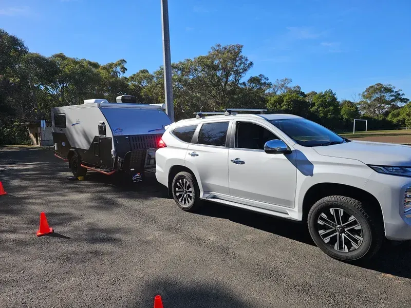 White SUV Car With Trailer Attached On Its Back — A Weigh In - Mobile Weighing Solutions in Noraville, NSW