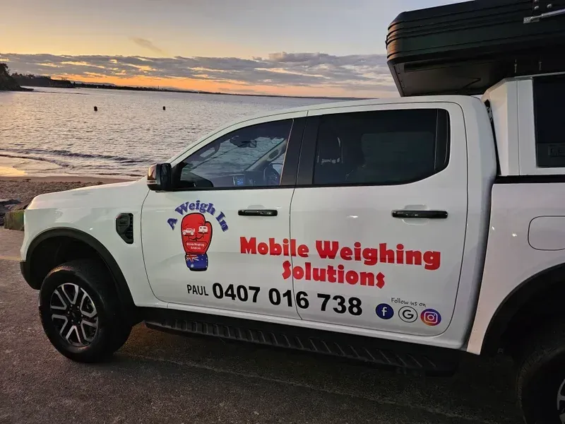 White SUV With Mobile Weighing Solutions Details — A Weigh In - Mobile Weighing Solutions in Noraville, NSW