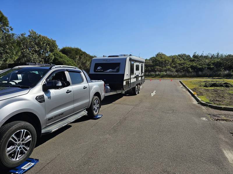 A Silver Pickup Truck With Word Ranger On The Side — A Weigh In - Mobile Weighing Solutions in Noraville, NSW