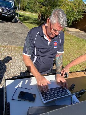 Man Using Laptop — A Weigh In - Mobile Weighing Solutions in Noraville, NSW