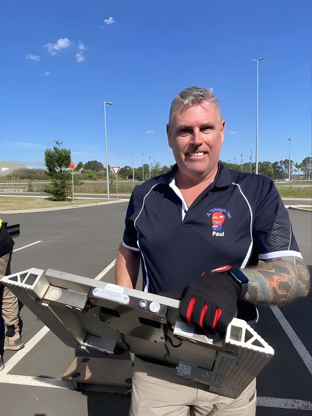 A Man Wearing A Shirt With His Working — A Weigh In - Mobile Weighing Solutions in Noraville, NSW