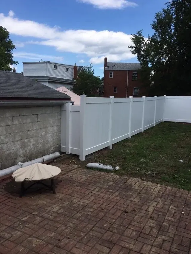 Fence Properly Built Beside House — Pittsburgh, PA — Affordable Fence & Railing, LLC
