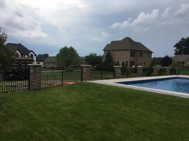 Fence Beside the Pool — Pittsburgh, PA — Affordable Fence & Railing, LLC