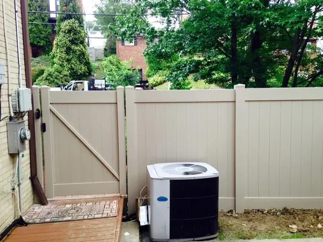 Residential Fence Beside Aircon System — Pittsburgh, PA — Affordable Fence & Railing, LLC