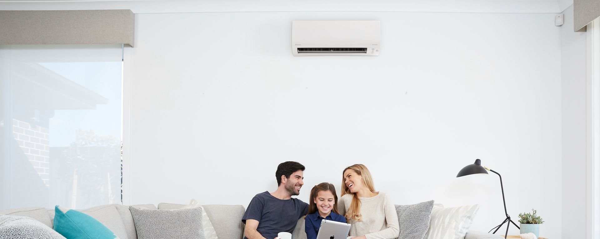 family with newly installed air conditioning