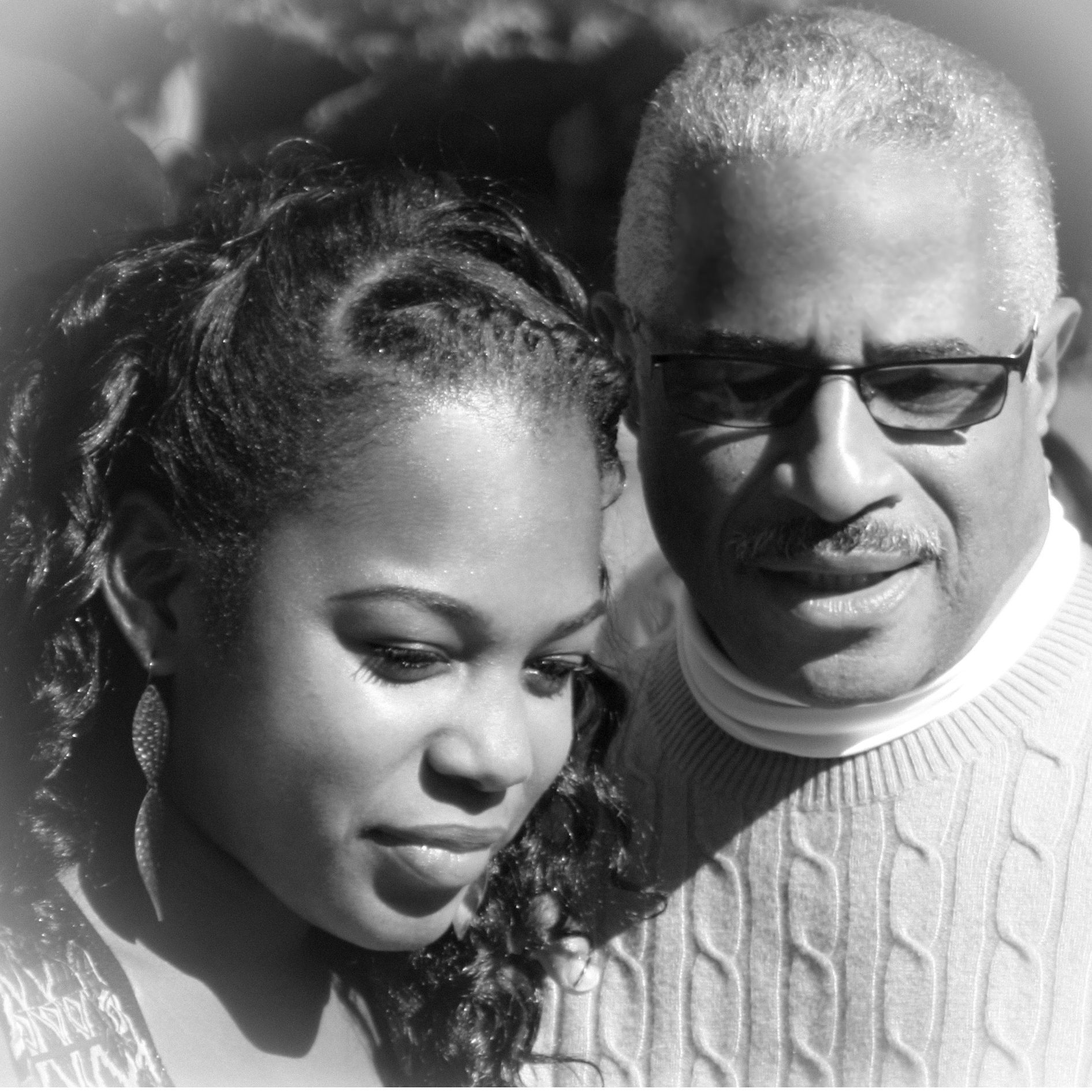 a black and white photo of a man and a woman