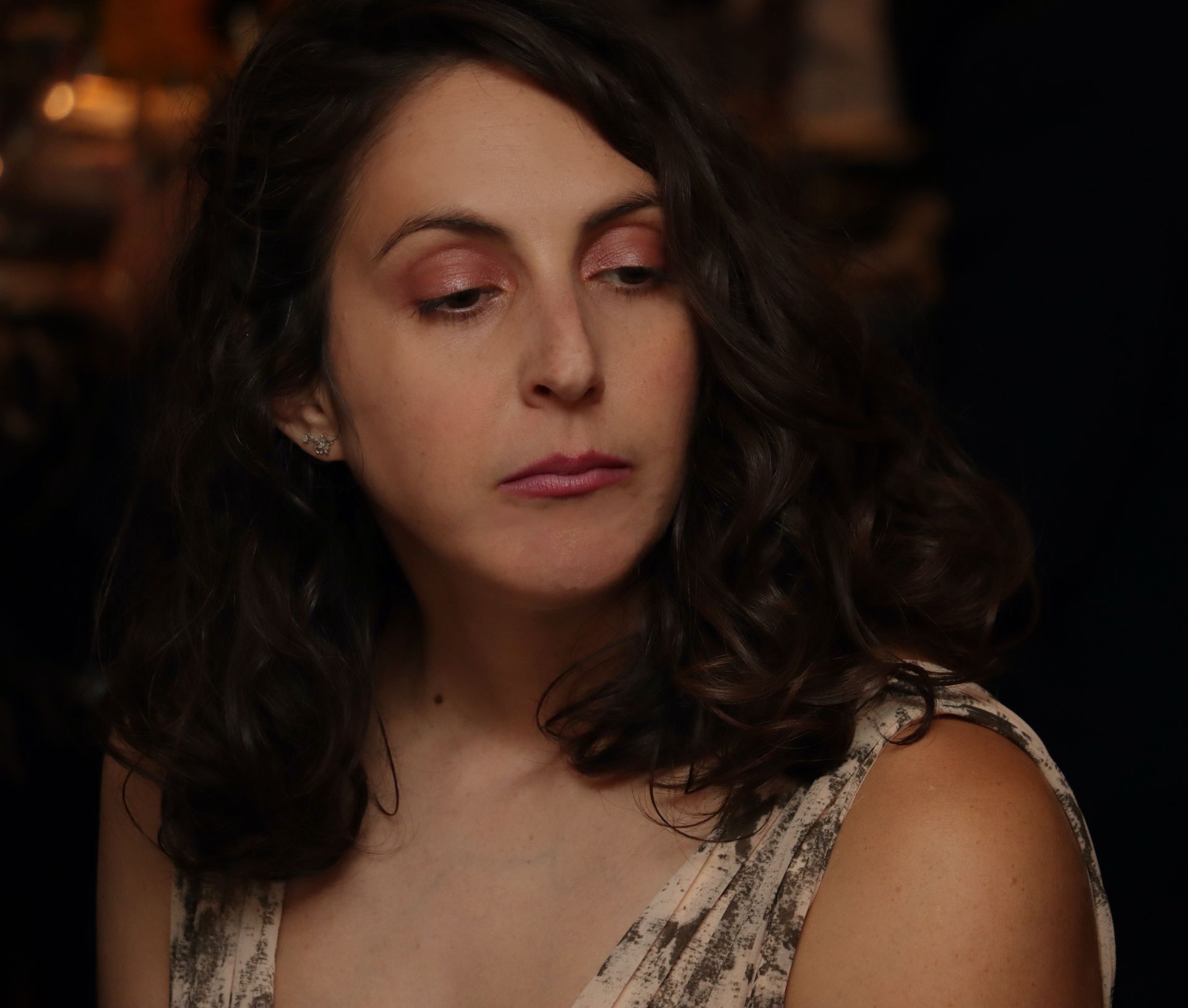 a woman with a serious look on her face