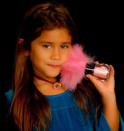 a little girl in a blue dress is holding a pink feather