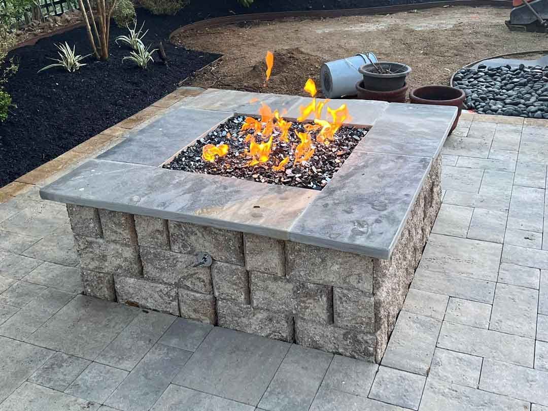 Modern square stone and marble gas fire pit