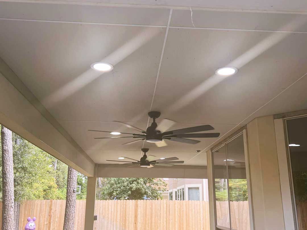 Wooden cover patio with drywall ceiling and fans