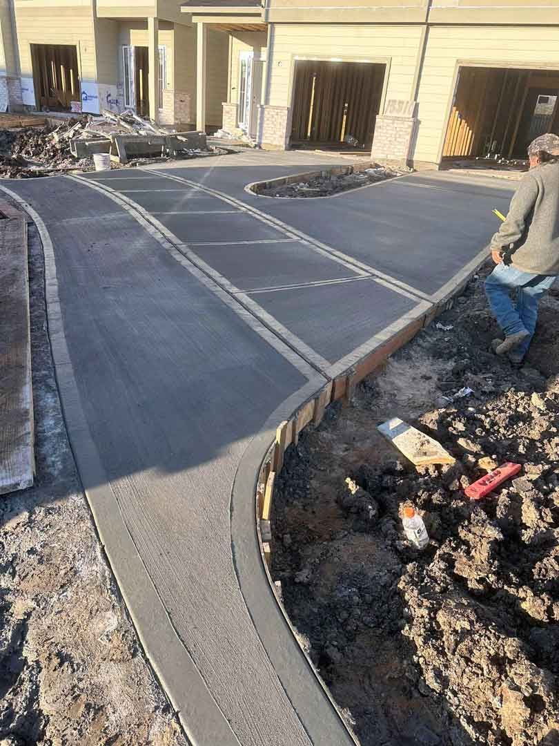 A concrete driveway is being built.