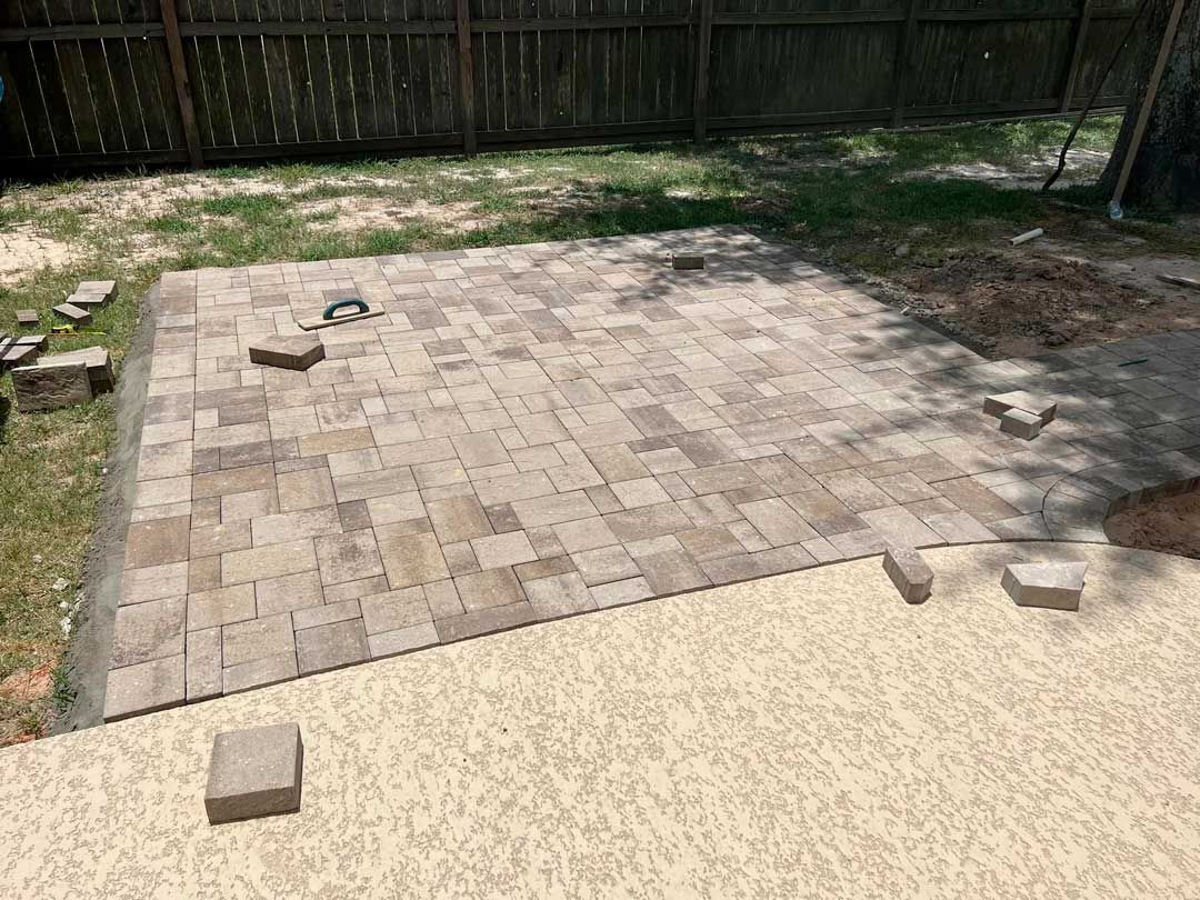 Backyard paver patio construction
