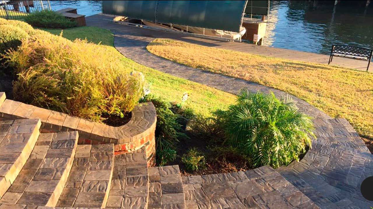 Limestone pavers staircase with landscaping and little bluestem plants