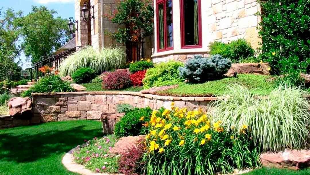 Residential Landscaping with stone walled beds