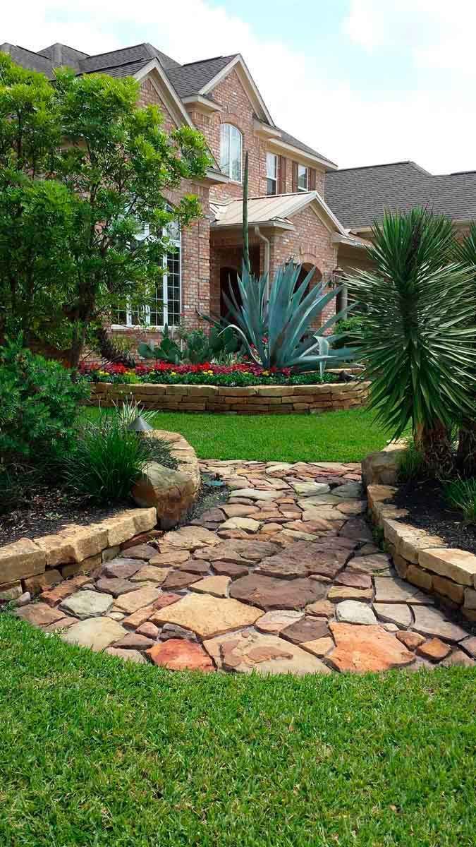 Stone path and landscape plant beds Desert Spoon