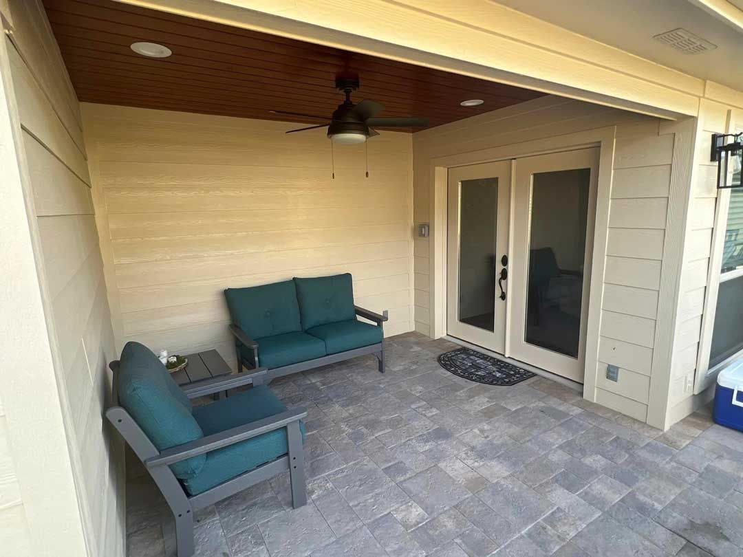 A small covered patio made of stamped concrete