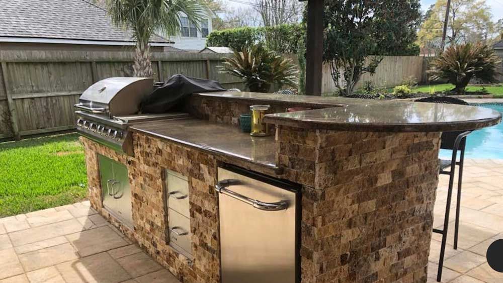 Custom covered outdoor kitchen