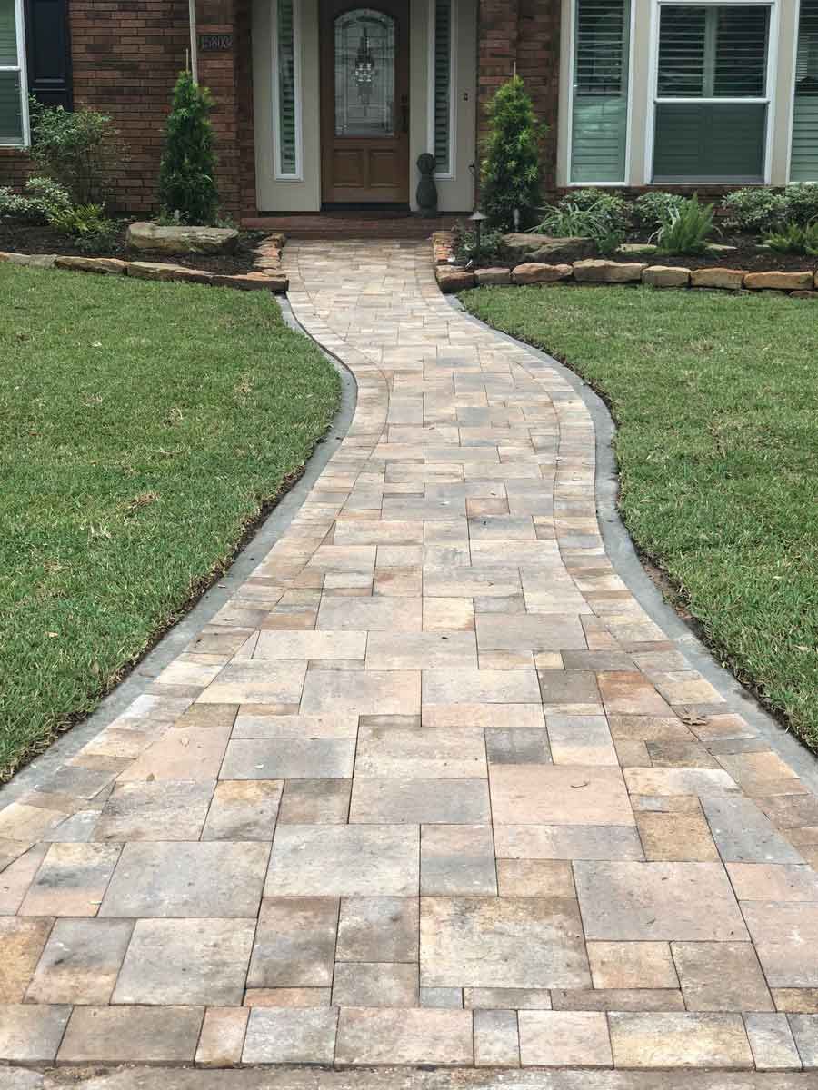 Long pathway in square limestone for entrance