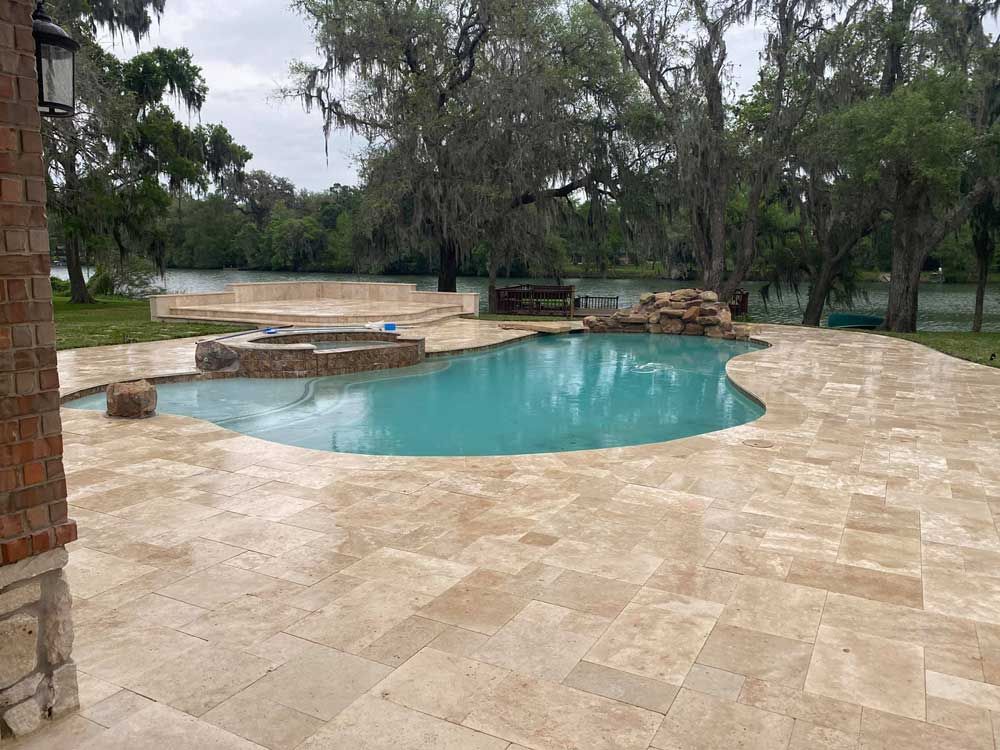 Pool area covered with glossy limestone