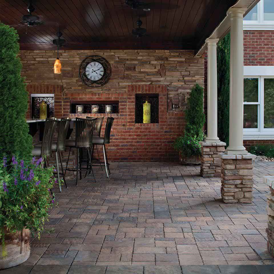 Elegant cedar-covered patio with bar and chairs