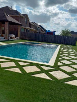 Artificial turf pool area