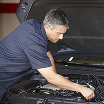 Certified Technician Performing Auto Repair Service