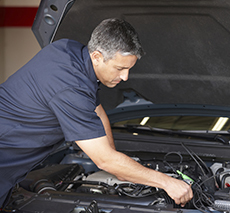 Certified Technician Performing Auto Repair Service