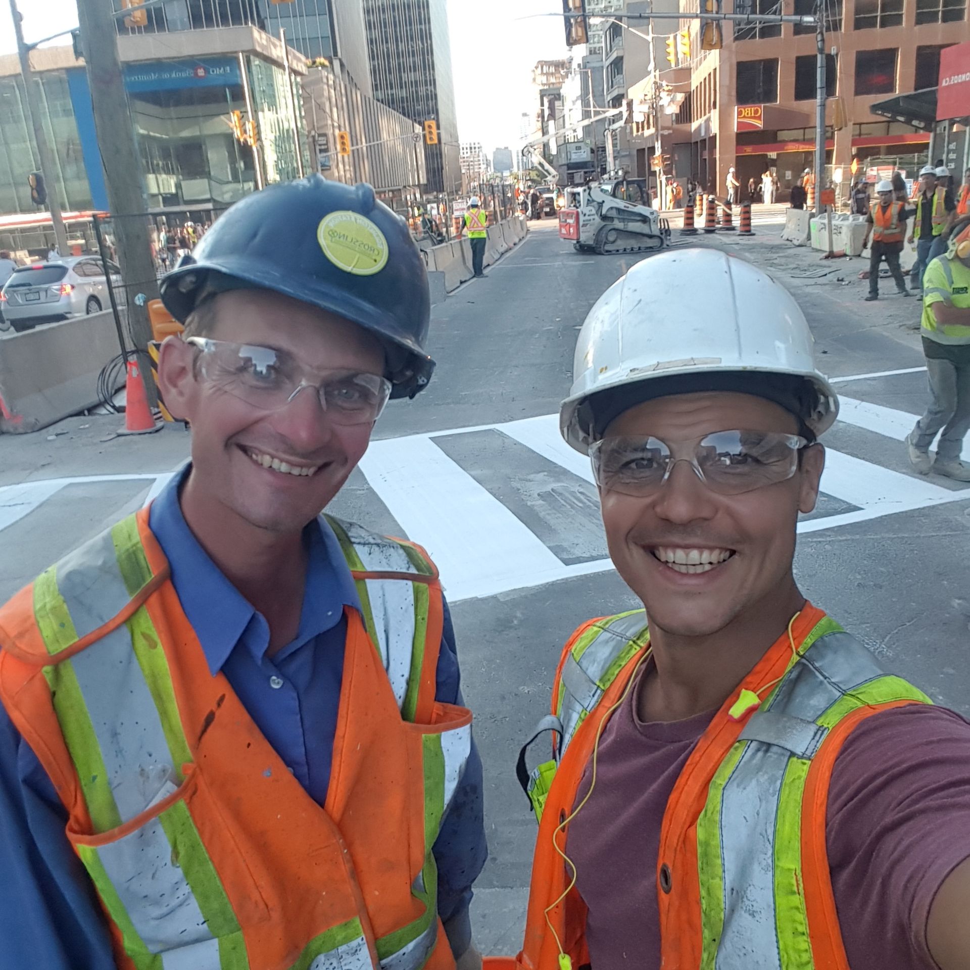 All Ontario Striping workers at job site wearing hard hats