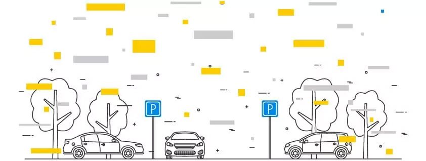 Cars parked near trees and parking signs.