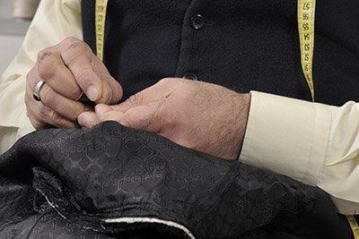 Tailor Mending a Dress Tailor Mending a Dress