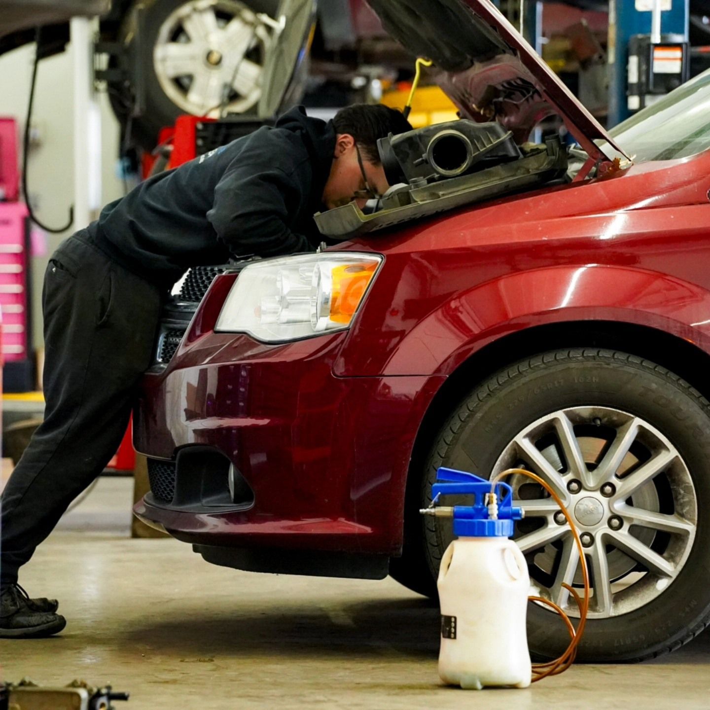 Mechanic Inspecting Engine During Auto Repair Service | Lenexa, KS