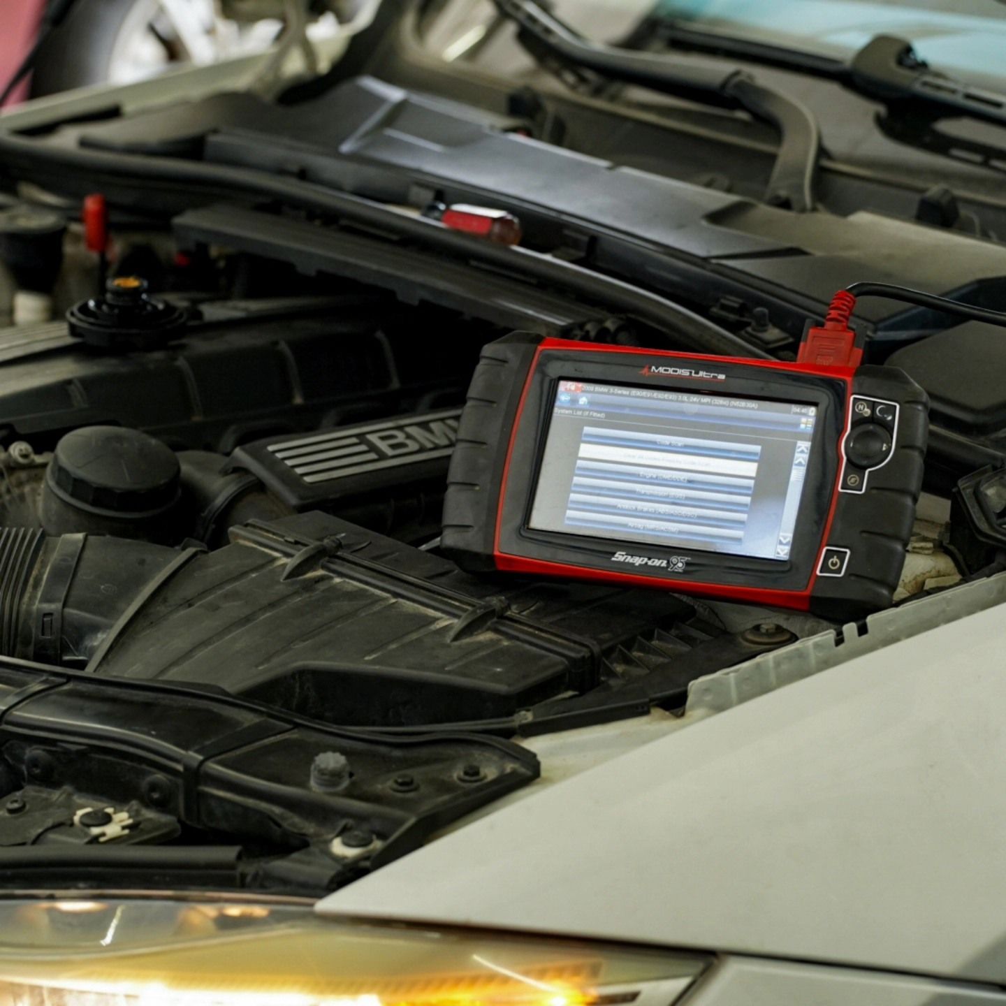Engine Diagnostic Scan Tool In Use During Vehicle Inspection | Lenexa, KS
