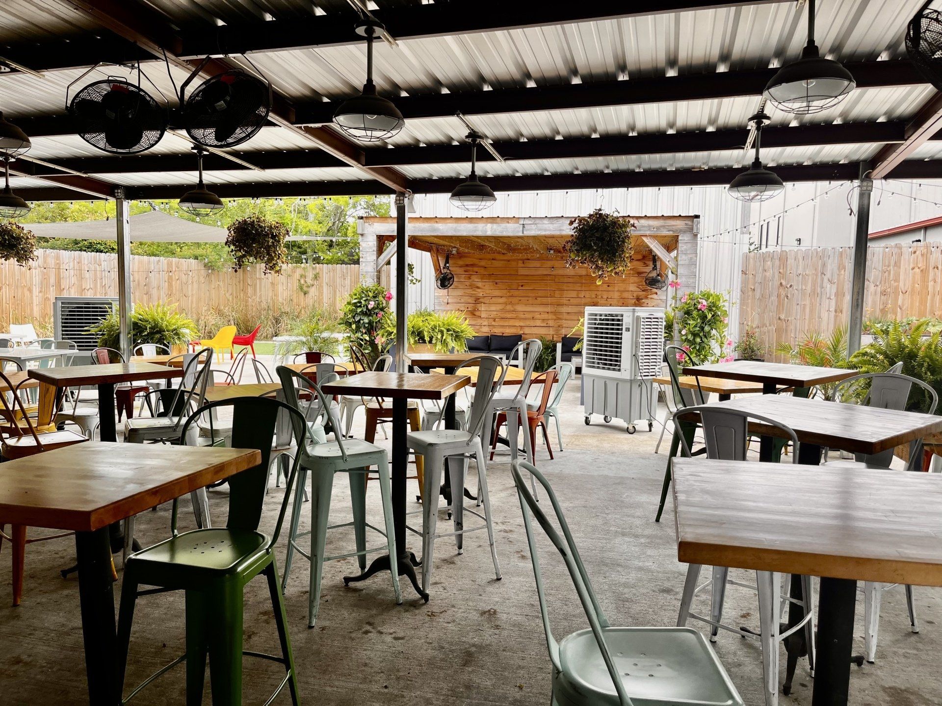 fans in the outdoor area of brq