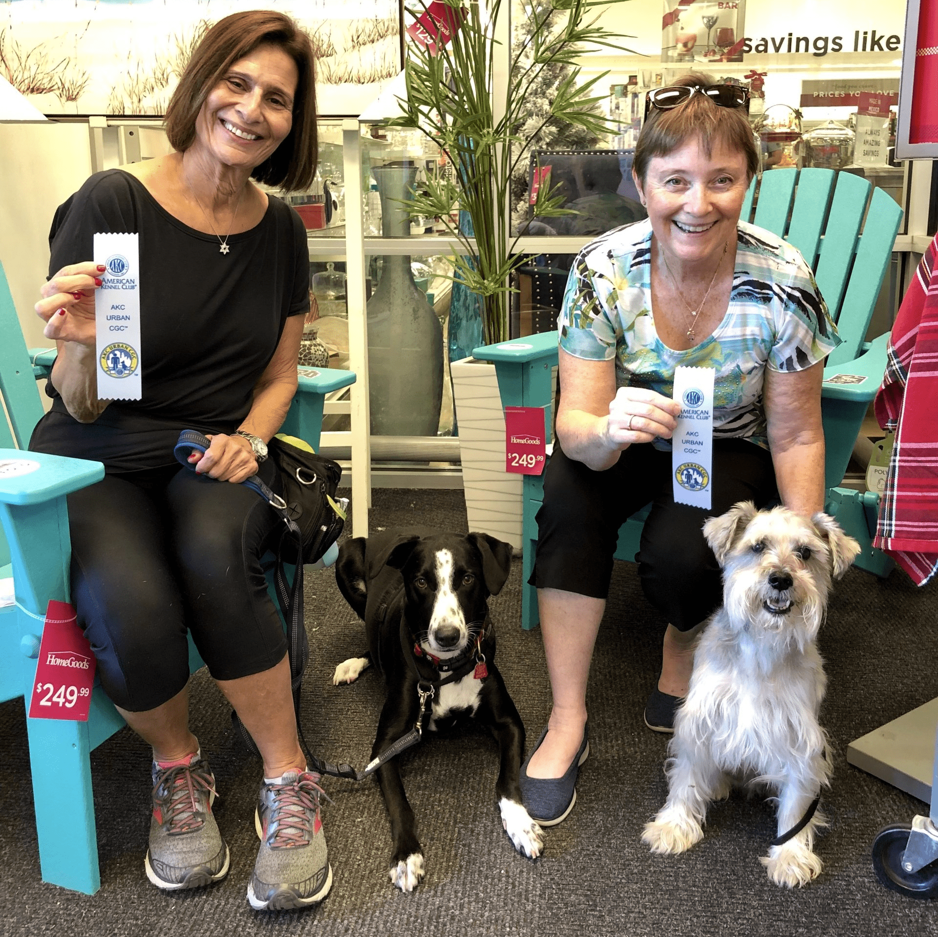 two women with their dogs